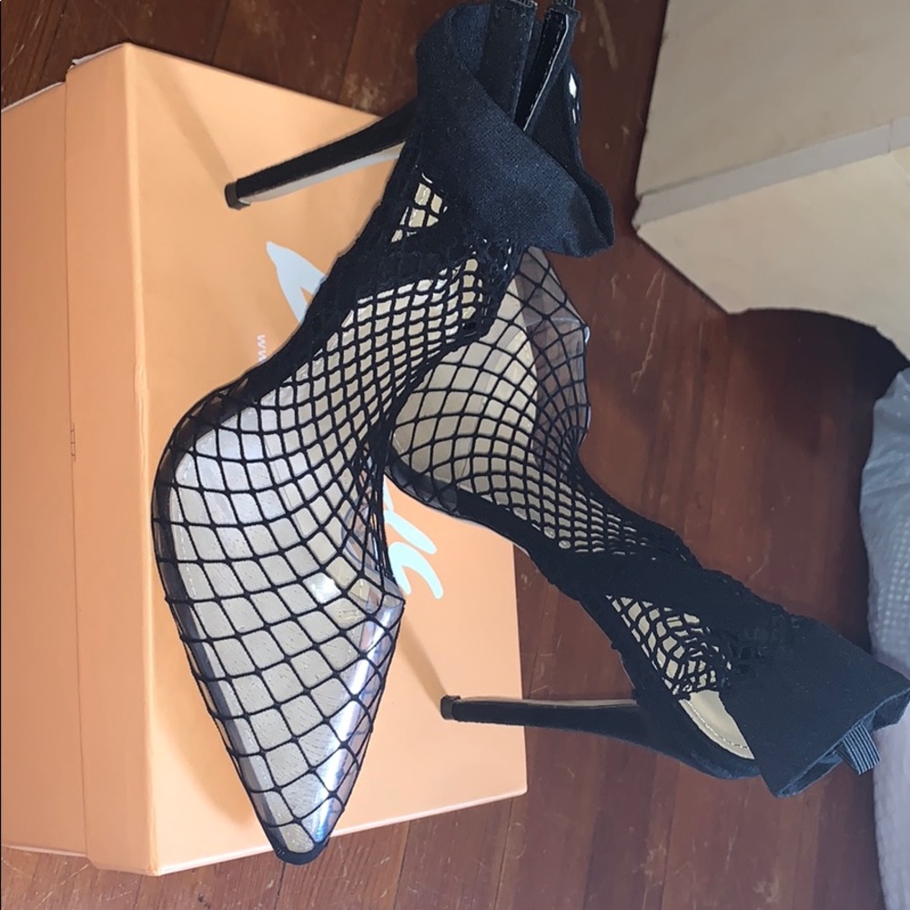 Black fishnet heels